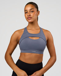 Woman wearing LimitLift Sports Bra - Night Shadow | Model:Rosie | Size:S