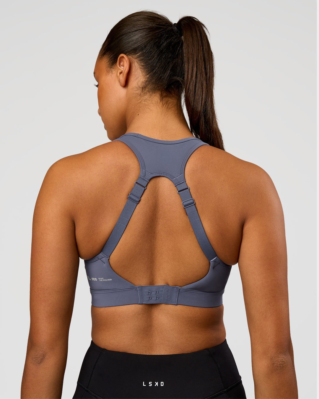 Woman wearing LimitLift Sports Bra - Night Shadow | Model:Rosie | Size:S