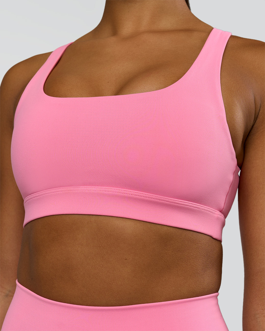 Model wearing Limitless Sports Bra - Candy Pink | Model:Rosie | Size:S