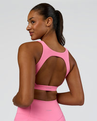 Model wearing Limitless Sports Bra - Candy Pink | Model:Rosie | Size:S