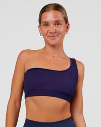 Woman wearing Lively Seamless Ribbed Sports Bra - Future Navy-Ultra Fuchsia | Model:Amity | Size:S
