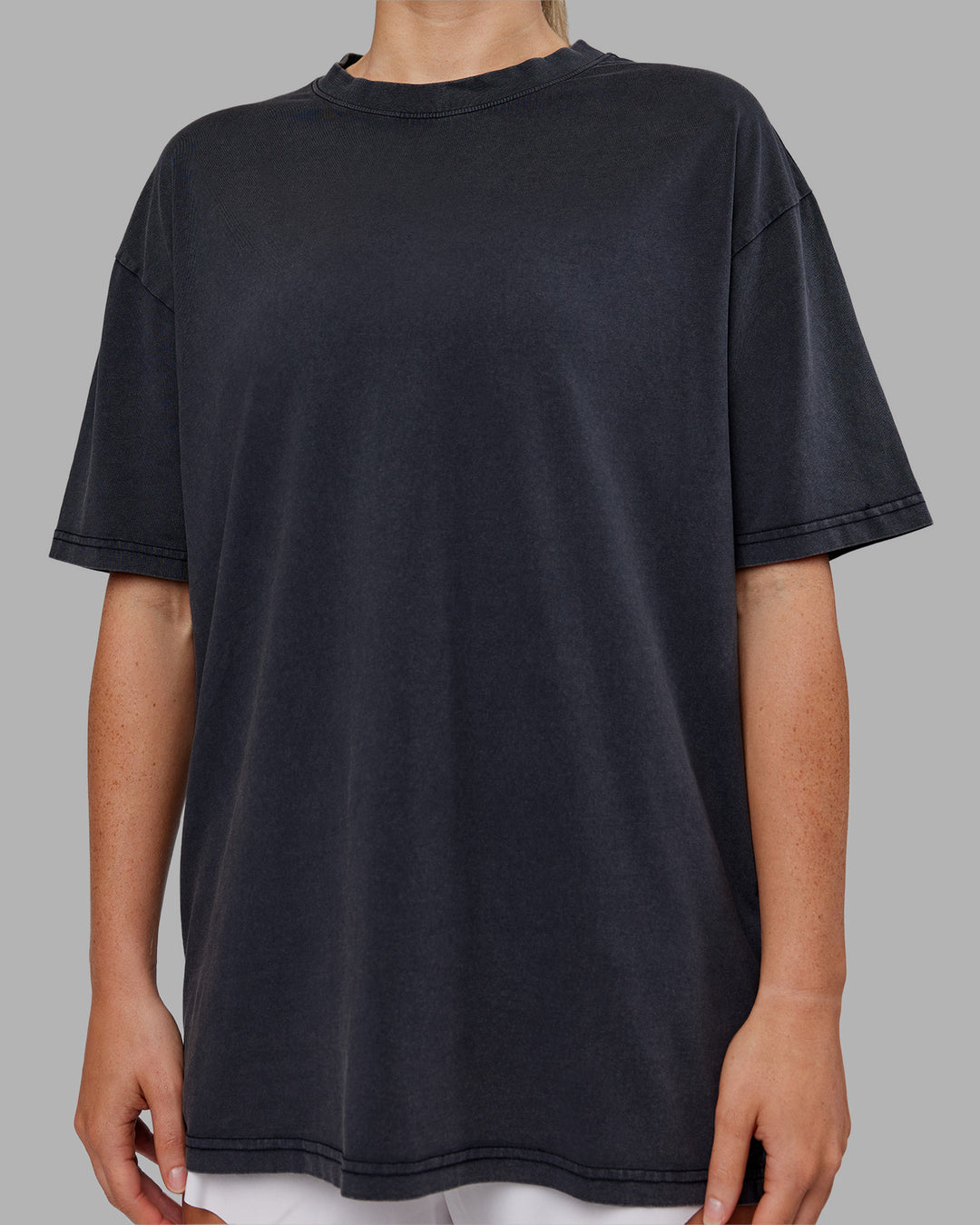 Woman wearing Love The Run FLXCotton Tee Oversize - Black Washed-Circular Grey | Model:Neve | Size:S