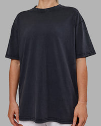 Woman wearing Love The Run FLXCotton Tee Oversize - Black Washed-Circular Grey | Model:Neve | Size:S