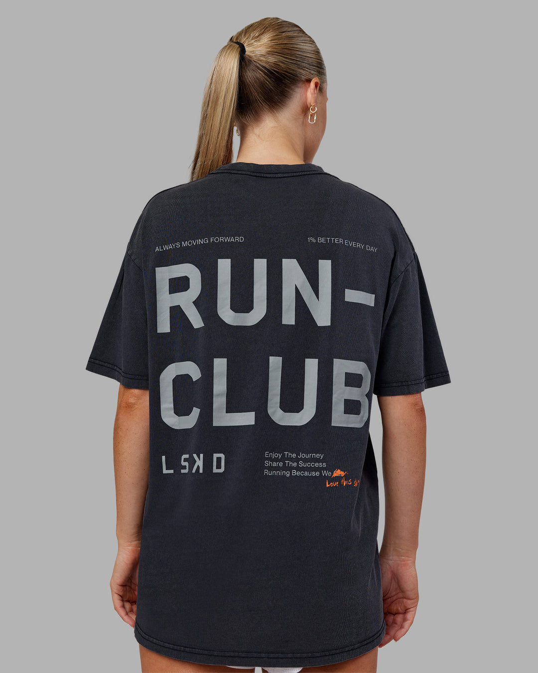 Woman wearing Love The Run FLXCotton Tee Oversize - Black Washed-Circular Grey | Model:Neve | Size:S