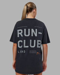 Woman wearing Love The Run FLXCotton Tee Oversize - Black Washed-Circular Grey | Model:Neve | Size:S