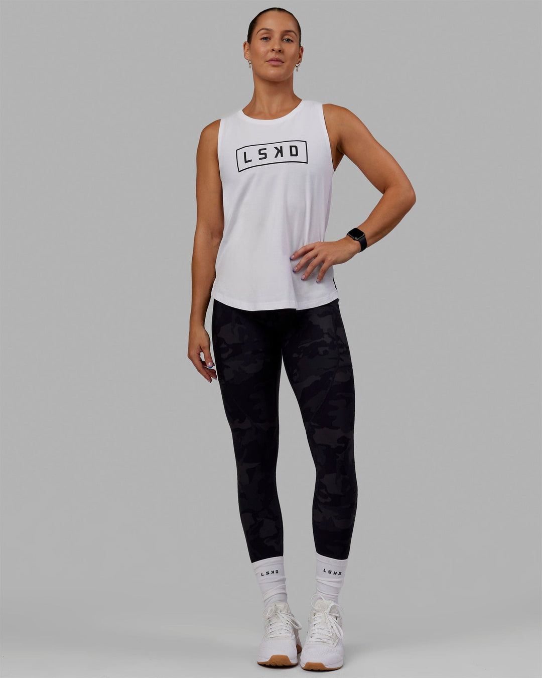 Woman wearing Luna FLXCotton Longline Tank - White-Black