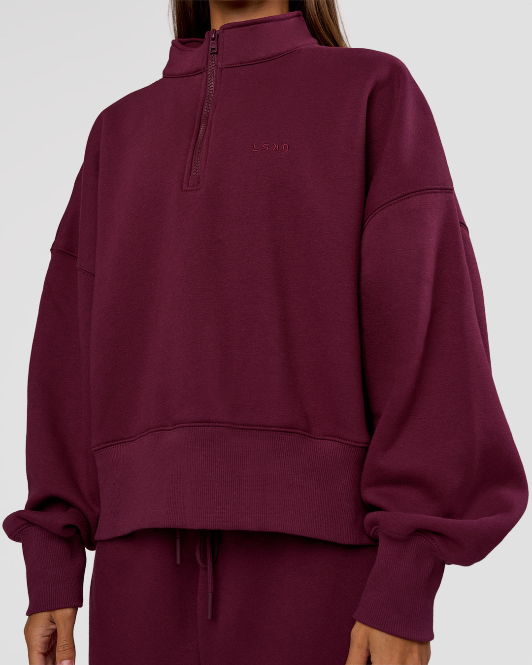 Woman wearing MVP 1/2 Zip Oversized Sweater - Cherry Lacquer | Model:Brylee | Size:S