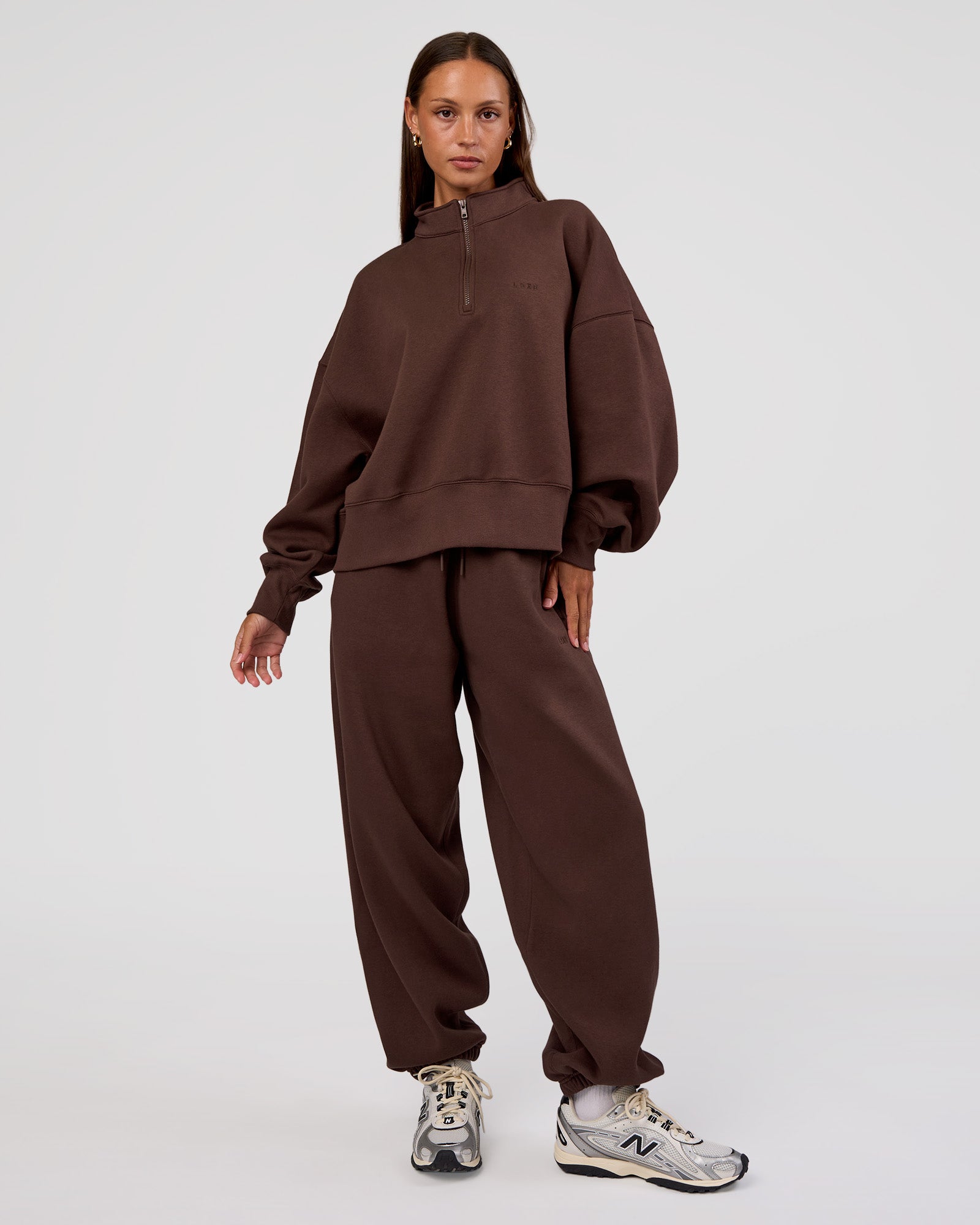 Woman wearing MVP 1/2 Zip Oversized Sweater - Hot Chocolate | Model:Brylee | Size:S