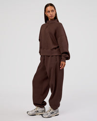 Woman wearing MVP 1/2 Zip Oversized Sweater - Hot Chocolate | Model:Brylee | Size:S