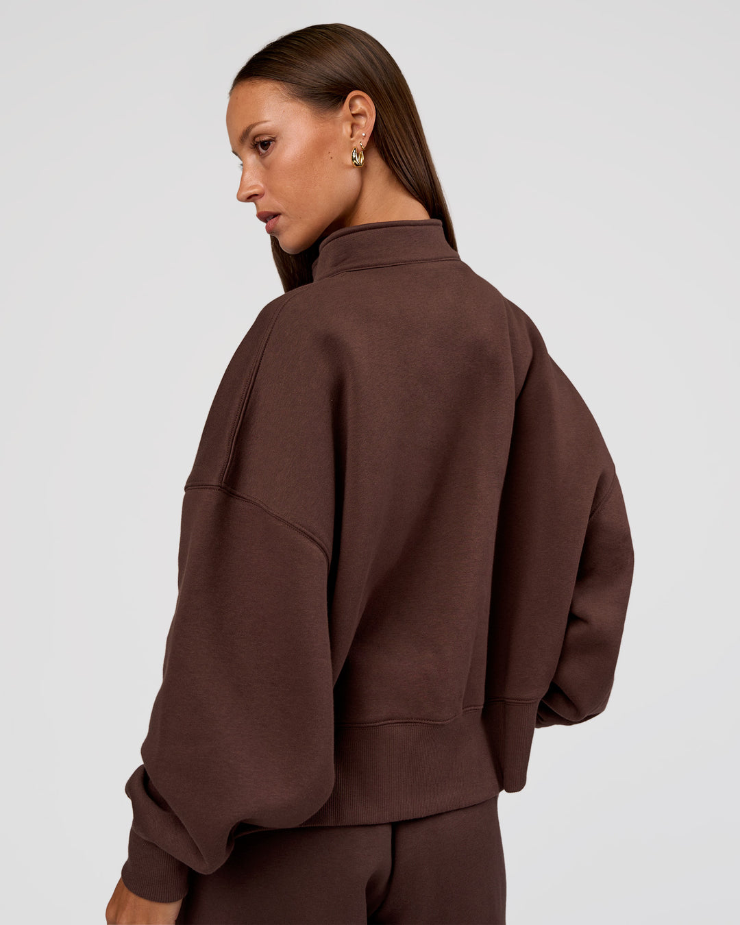 Woman wearing MVP 1/2 Zip Oversized Sweater - Hot Chocolate | Model:Brylee | Size:S