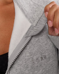Woman wearing MVP 1/2 Zip Oversized Sweater - Light Grey Marl | Model:Brylee | Size:S