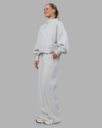 Woman wearing MVP 1/2 Zip Oversized Sweater - Digital Mist | Model:Neve | Size:S