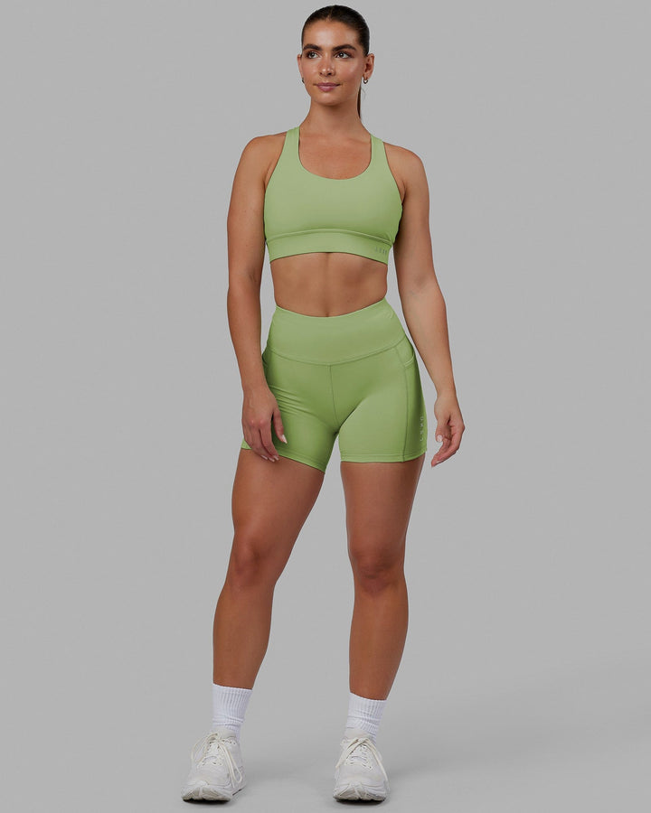 Woman wearing MVP 2.0 Sports Bra - Green Fig