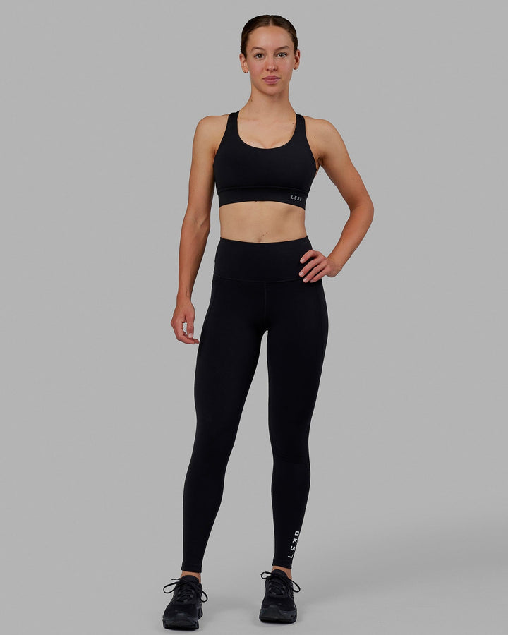 Woman wearing MVP 2.0 Sports Bra - Black