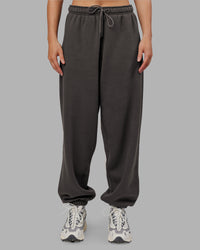 Woman wearing MVP Oversized Slouchy Fit Track Pant - Dark Storm | Model:Neve | Size:S