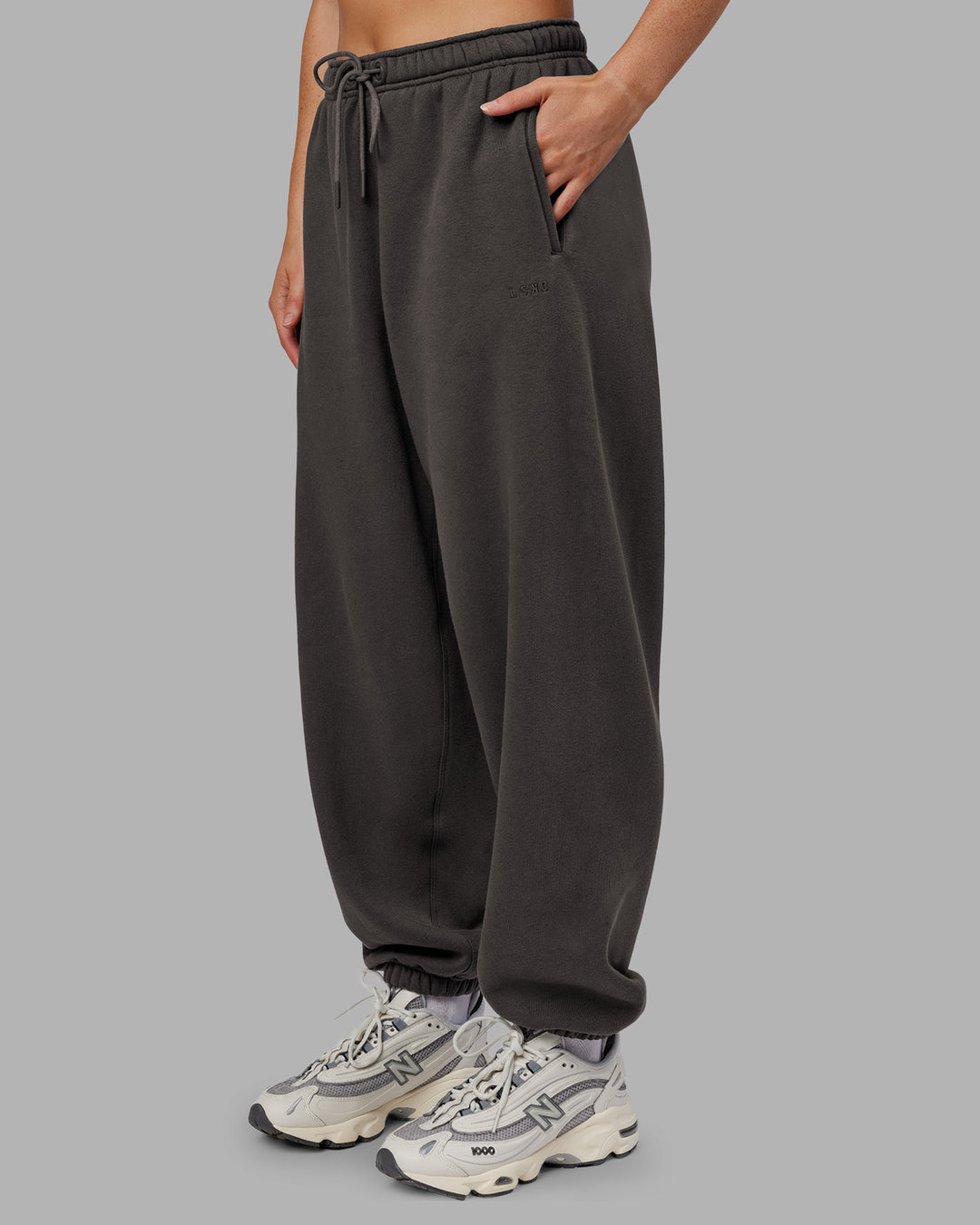 Woman wearing MVP Oversized Slouchy Fit Track Pant - Dark Storm | Model:Neve | Size:S