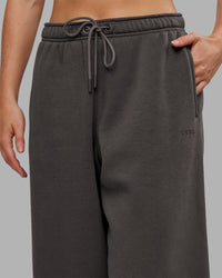 Woman wearing MVP Oversized Slouchy Fit Track Pant - Dark Storm | Model:Neve | Size:S