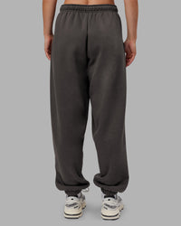Woman wearing MVP Oversized Slouchy Fit Track Pant - Dark Storm | Model:Neve | Size:S
