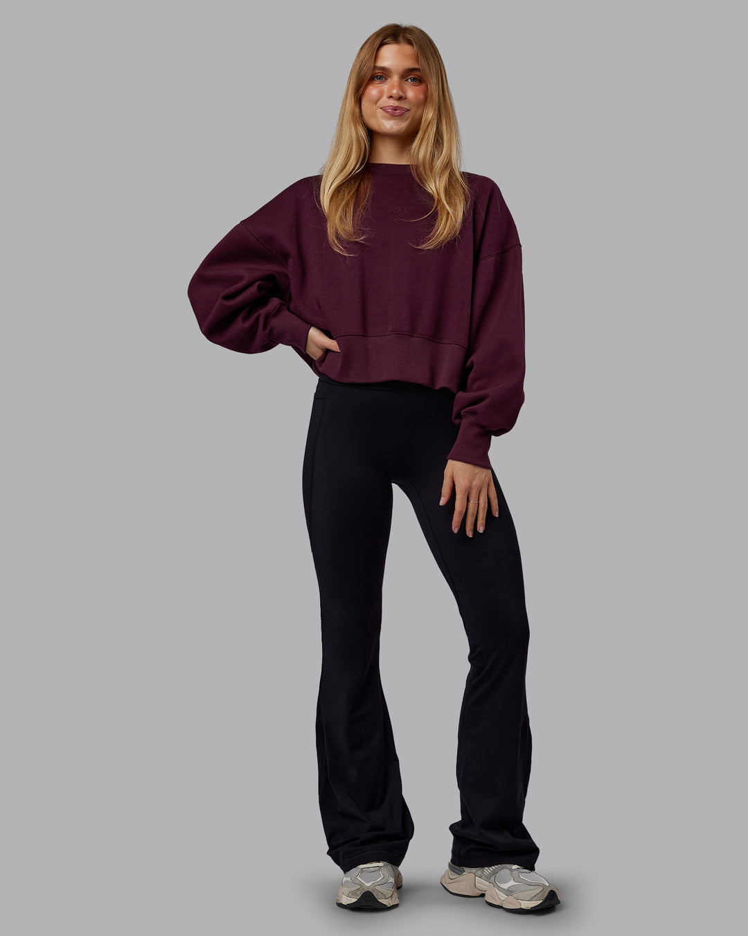 Woman wearing MVP Oversized Sweater - Cherry Lacquer | Model:Emilie | Size:S