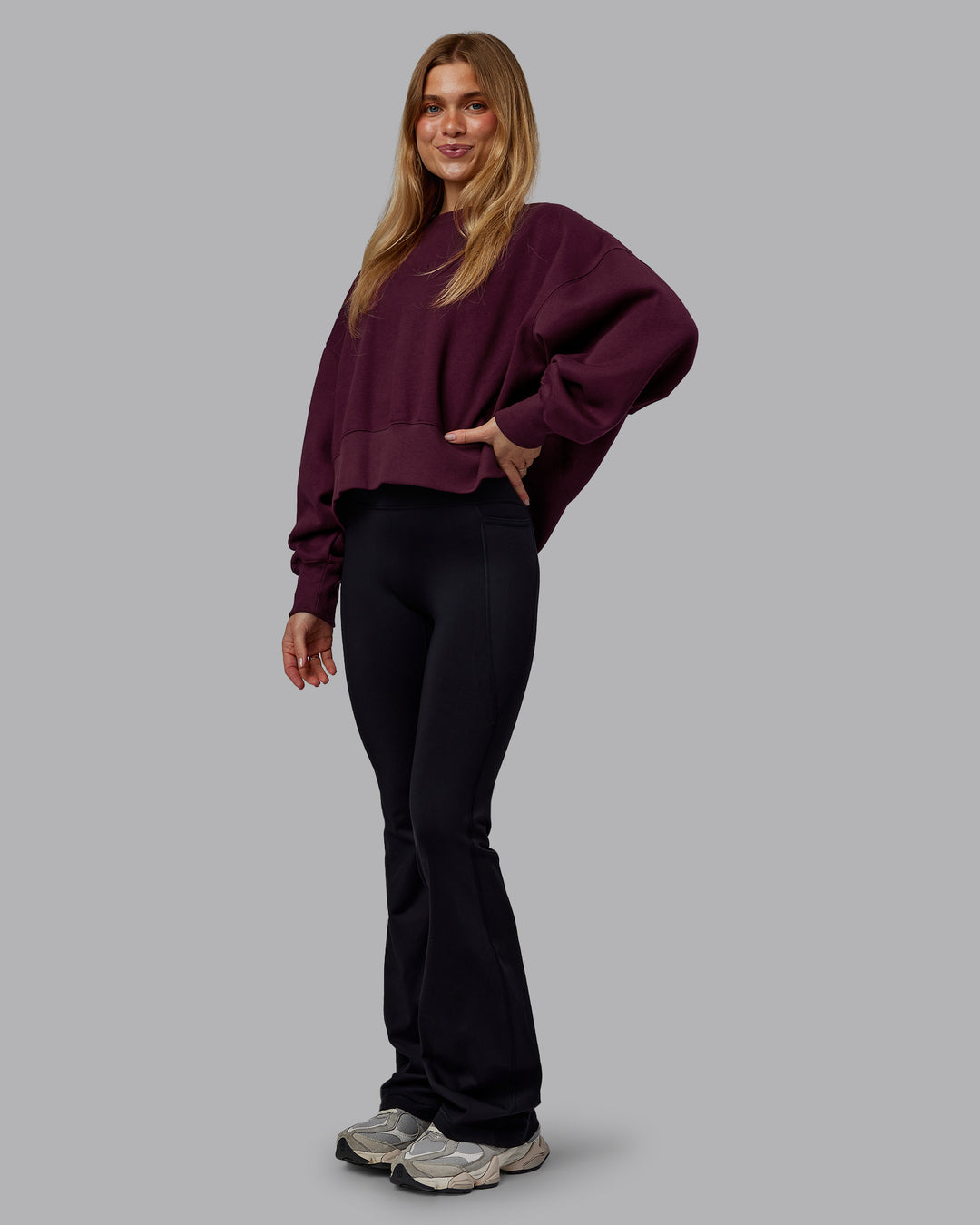 Woman wearing MVP Oversized Sweater - Cherry Lacquer | Model:Emilie | Size:S