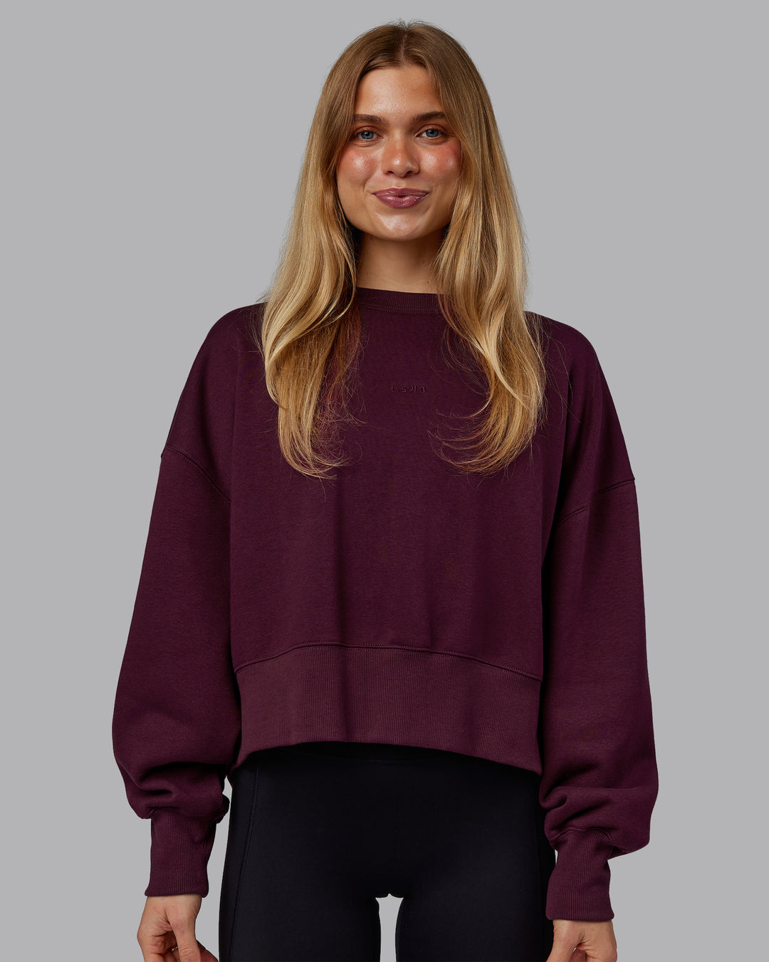Woman wearing MVP Oversized Sweater - Cherry Lacquer | Model:Emilie | Size:S