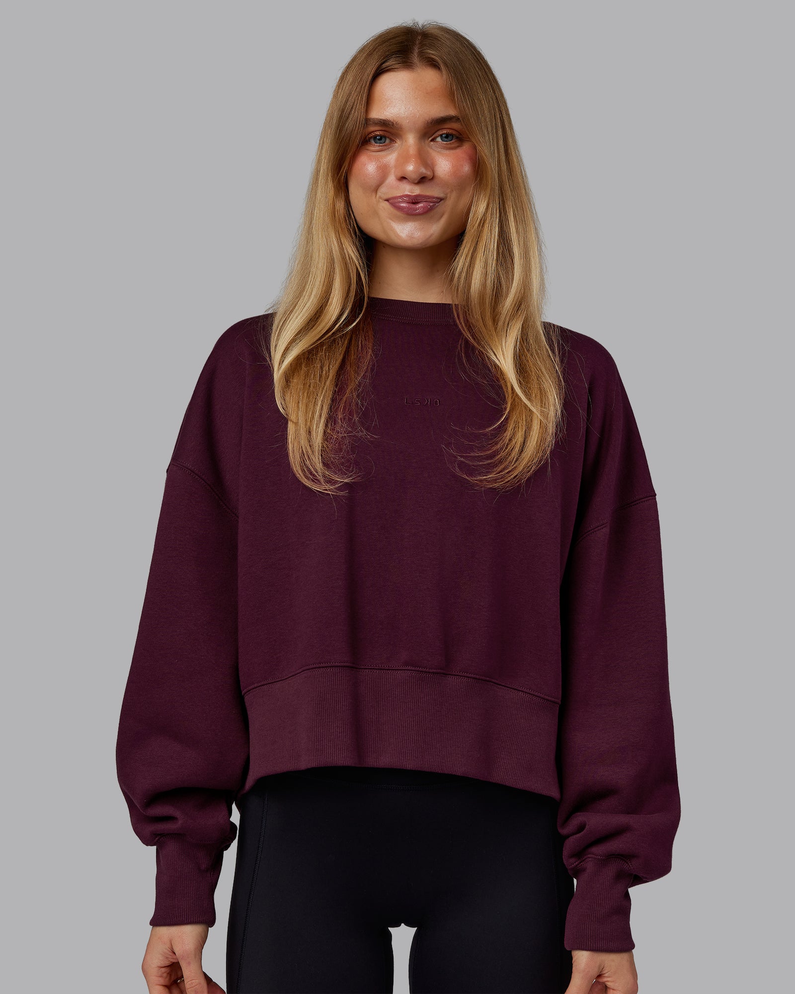 Woman wearing MVP Oversized Sweater - Cherry Lacquer | Model:Emilie | Size:S