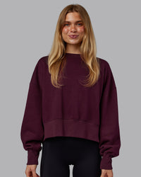 Woman wearing MVP Oversized Sweater - Cherry Lacquer | Model:Emilie | Size:S