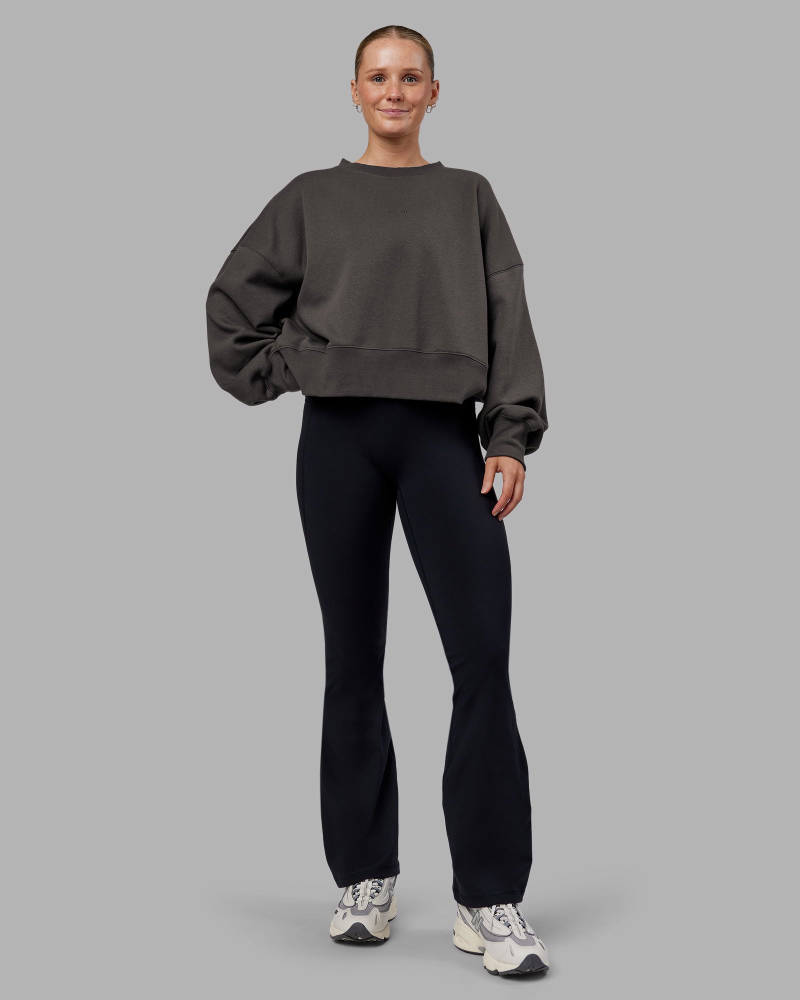 Woman wearing MVP Oversized Sweater - Dark Storm | Model:Neve | Size:S
