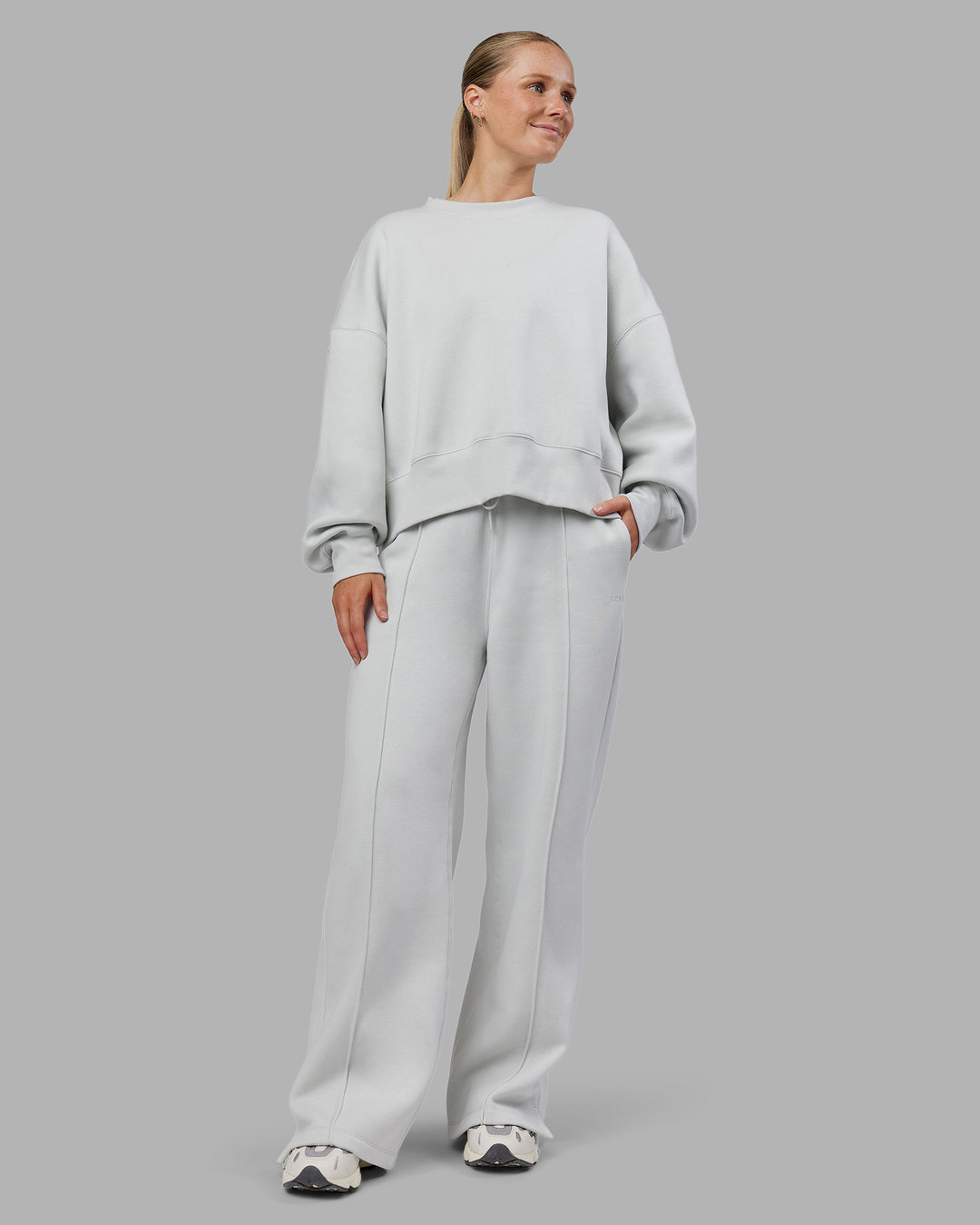 Woman wearing MVP Oversized Sweater - Digital Mist | Model:Neve | Size:S
