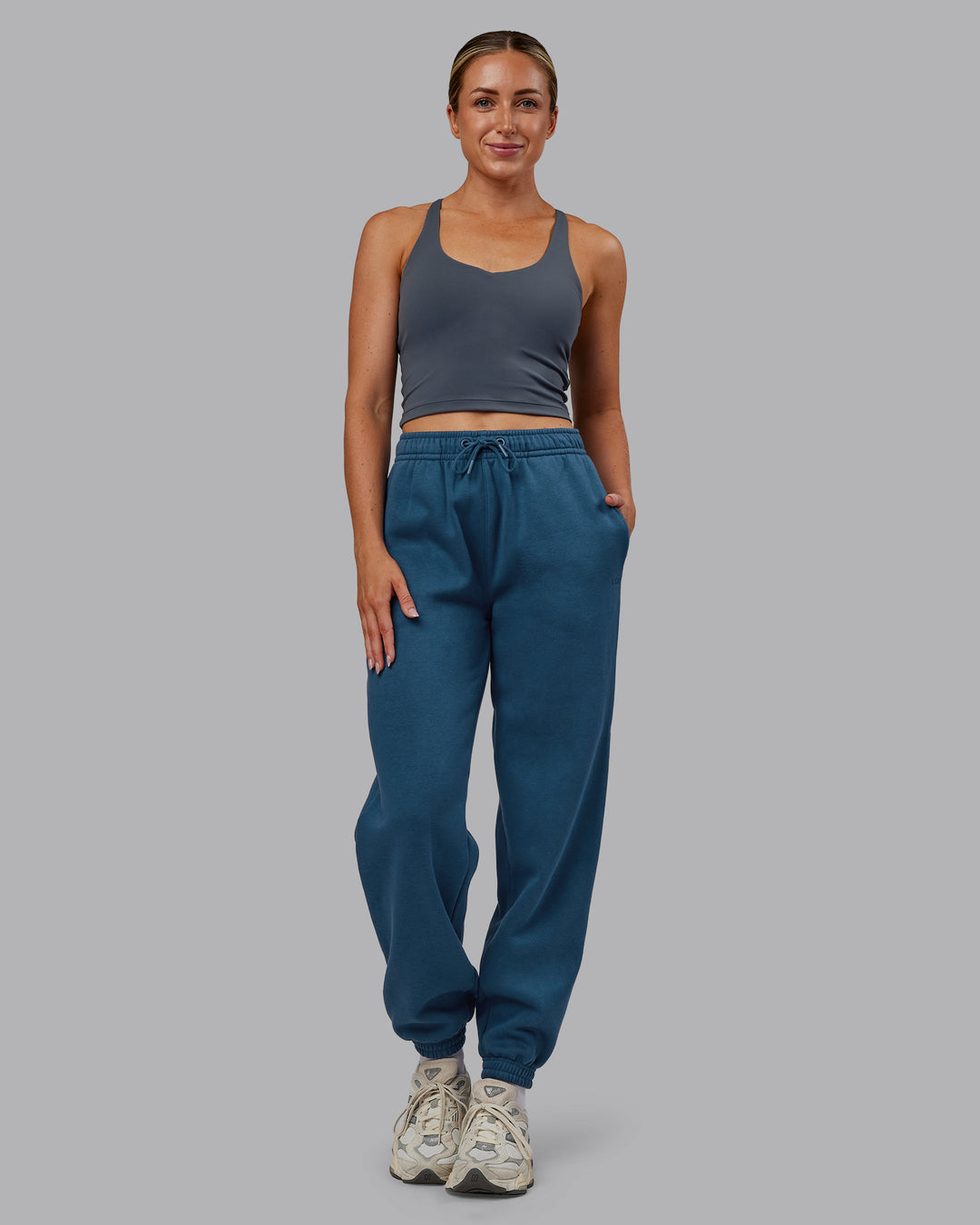 Woman wearing MVP Track Pant - Indigo | Model:Paris | Size:S