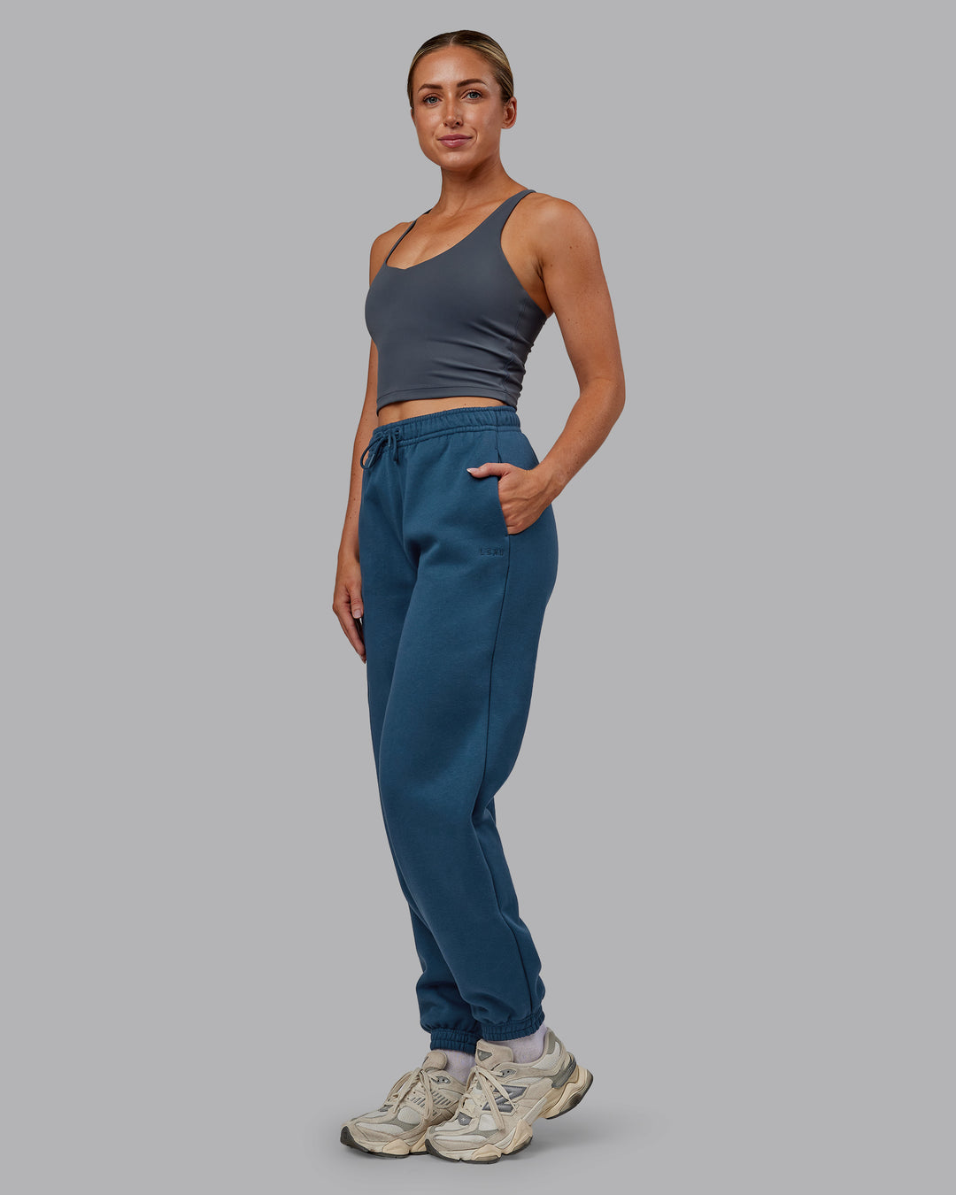 Woman wearing MVP Track Pant - Indigo | Model:Paris | Size:S