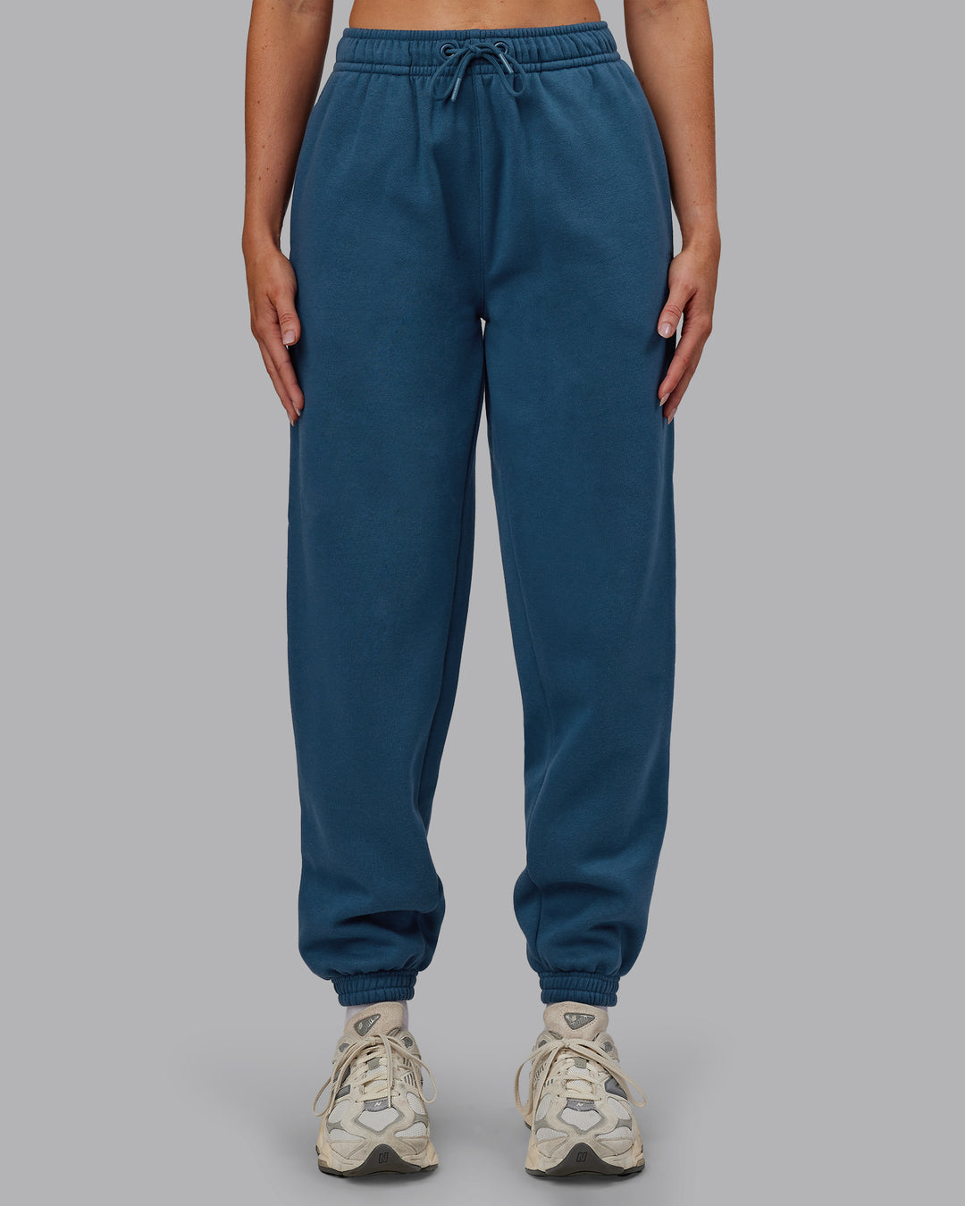 Woman wearing MVP Track Pant - Indigo | Model:Paris | Size:S