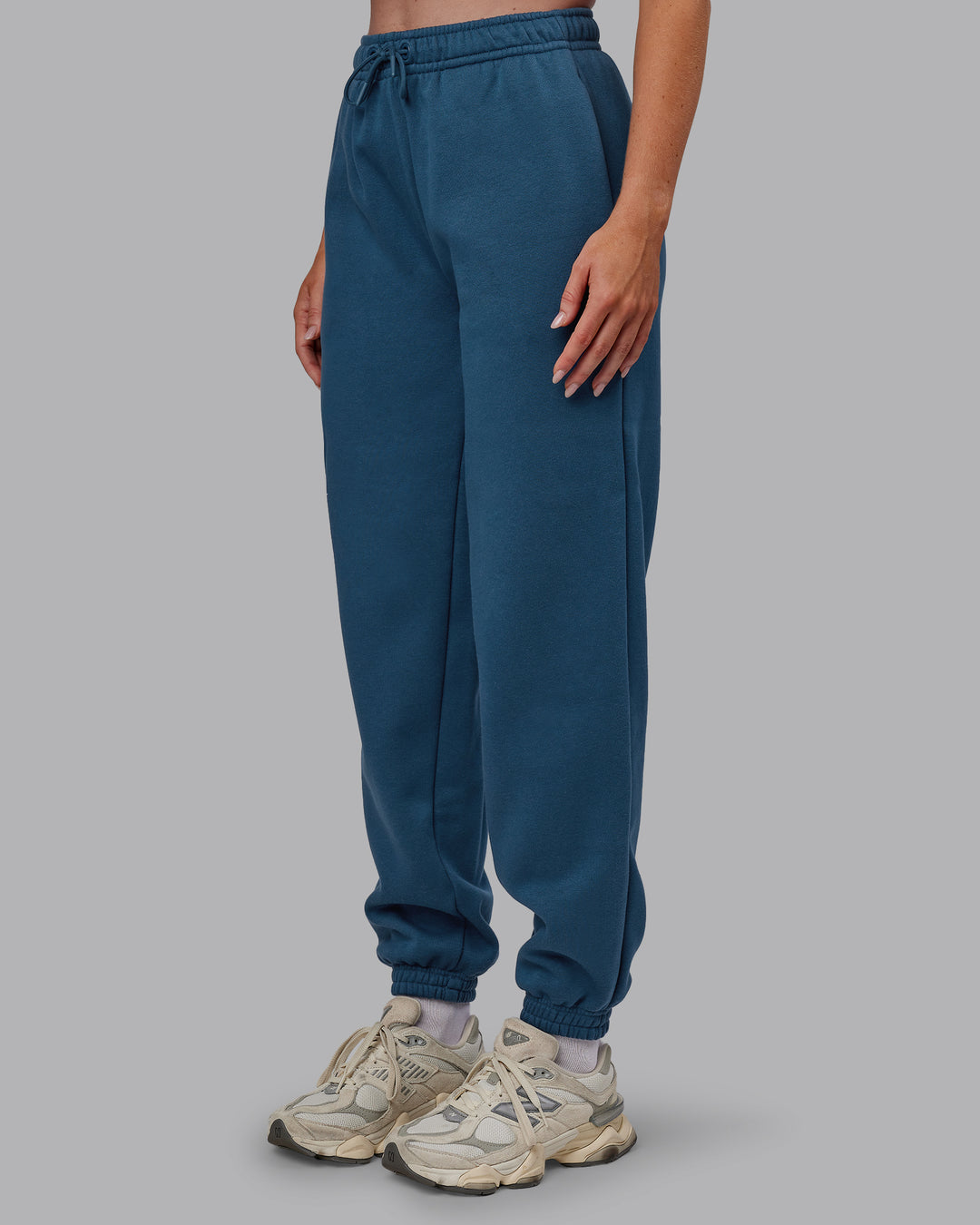 Woman wearing MVP Track Pant - Indigo | Model:Paris | Size:S
