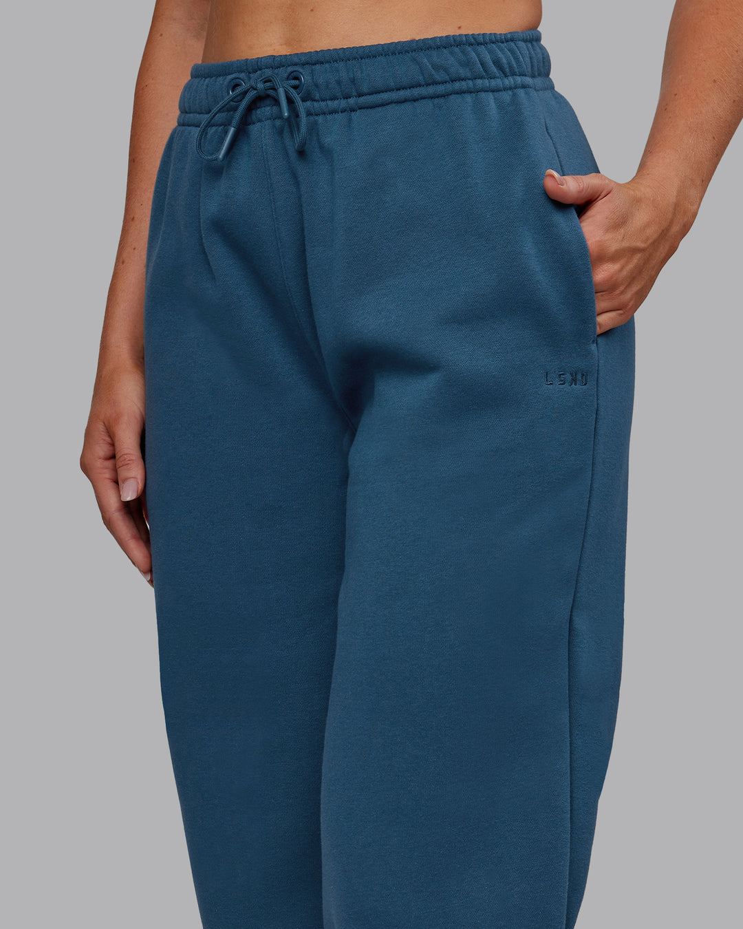 Woman wearing MVP Track Pant - Indigo | Model:Paris | Size:S