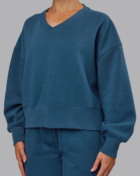 Woman wearing MVP V Neck Oversized Sweater - Indigo | Model:Paris | Size:S