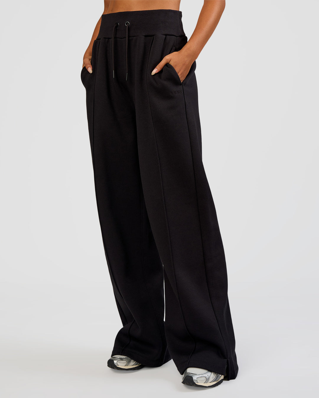 Woman wearing MVP Wide Leg Tall Track Pant - Black | Model:Ruby | Size:S