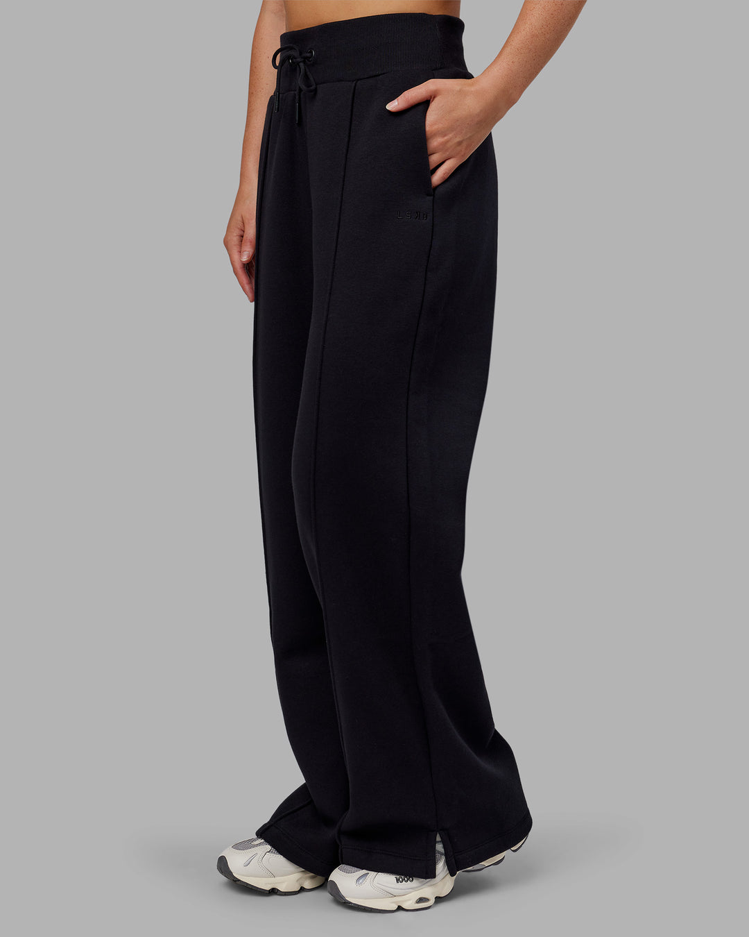 Woman wearing MVP Wide Leg Track Pant - Black | Model:Neve | Size:S