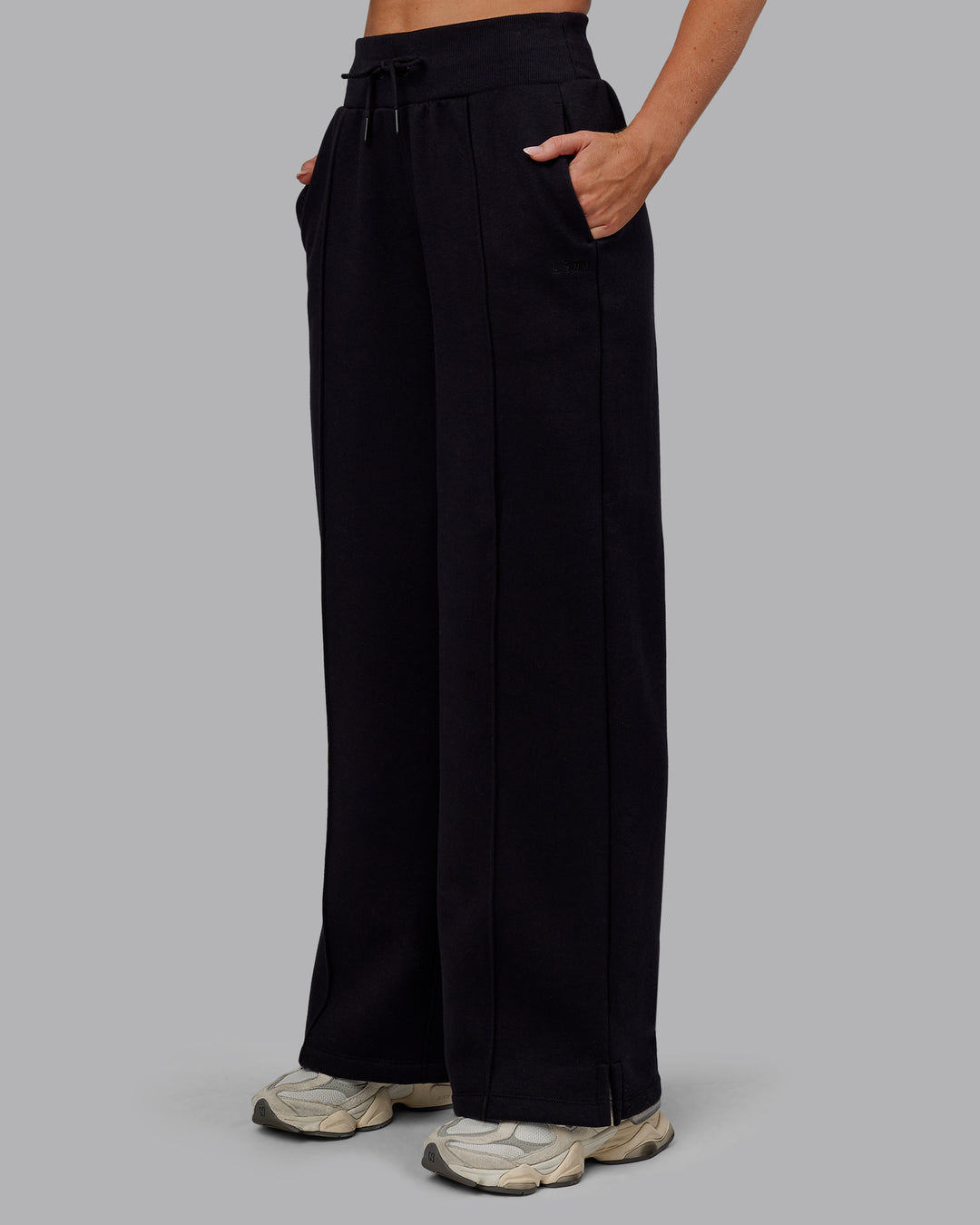 Woman wearing MVP Wide Leg Track Pant - Black | Model:Paris | Size:S