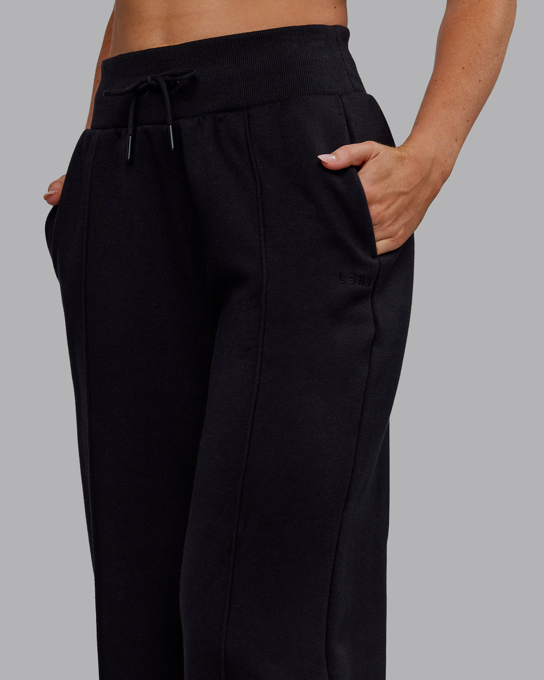 Woman wearing MVP Wide Leg Track Pant - Black | Model:Paris | Size:S