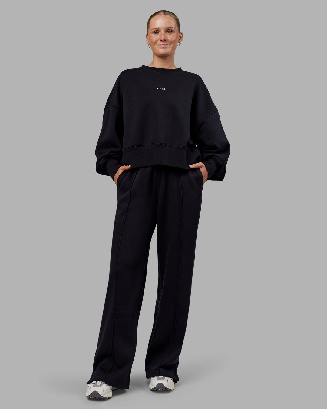 Woman wearing MVP Wide Leg Track Pant - Black | Model:Neve | Size:S
