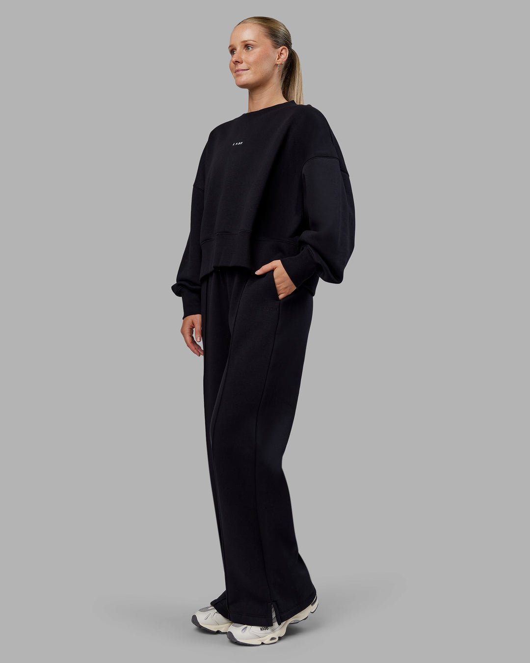 Woman wearing MVP Wide Leg Track Pant - Black | Model:Neve | Size:S
