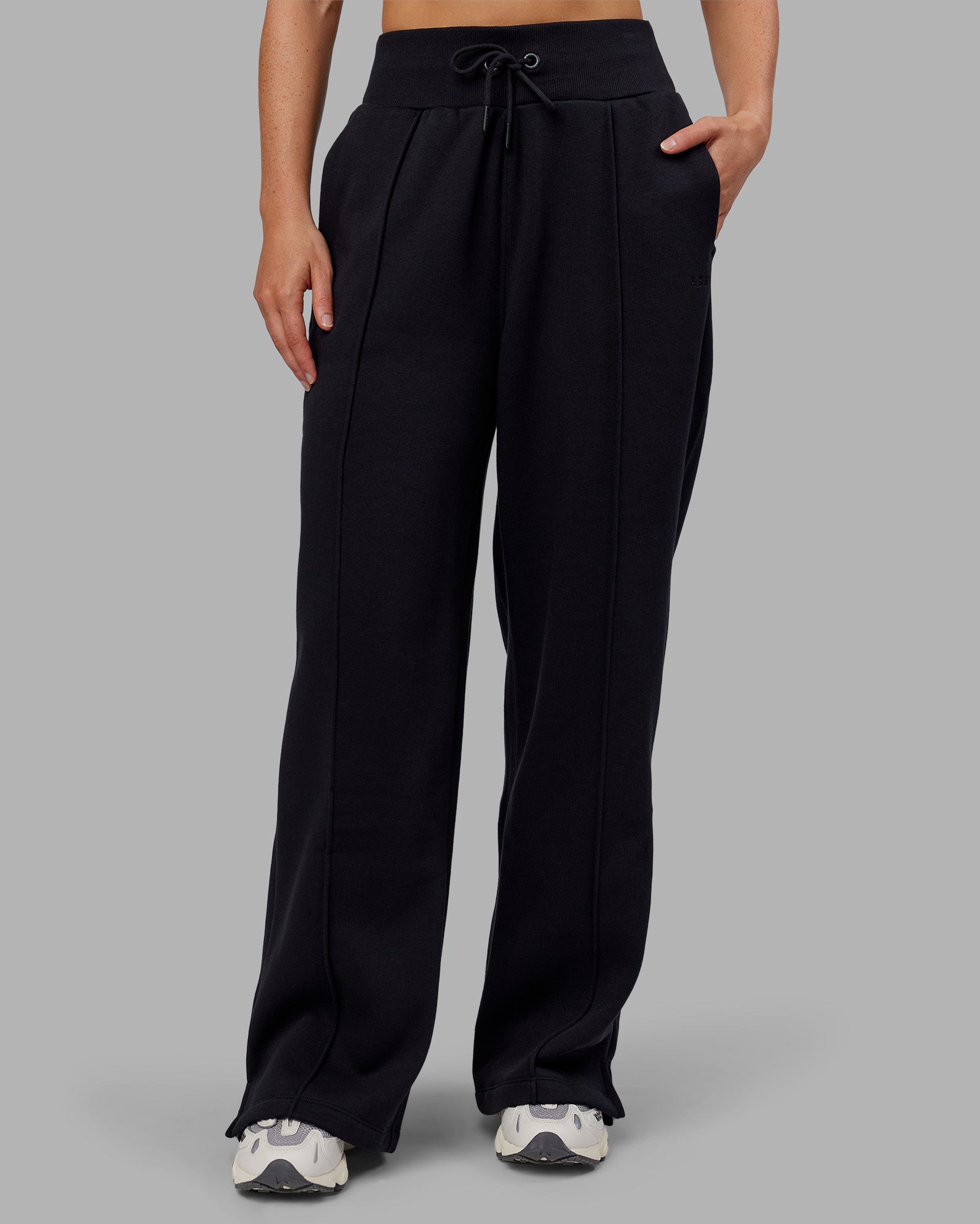 Woman wearing MVP Wide Leg Track Pant - Black | Model:Neve | Size:S