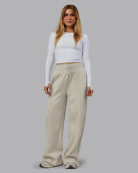 Woman wearing MVP Wide Leg Track Pant - Shale Beige | Model:Emilie | Size:S