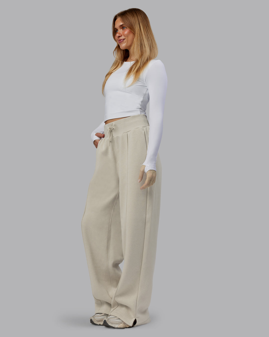 Woman wearing MVP Wide Leg Track Pant - Shale Beige | Model:Emilie | Size:S