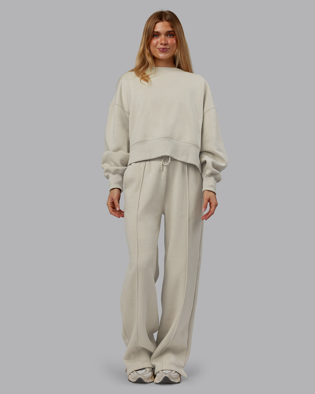 Woman wearing MVP Wide Leg Track Pant - Shale Beige | Model:Emilie | Size:S