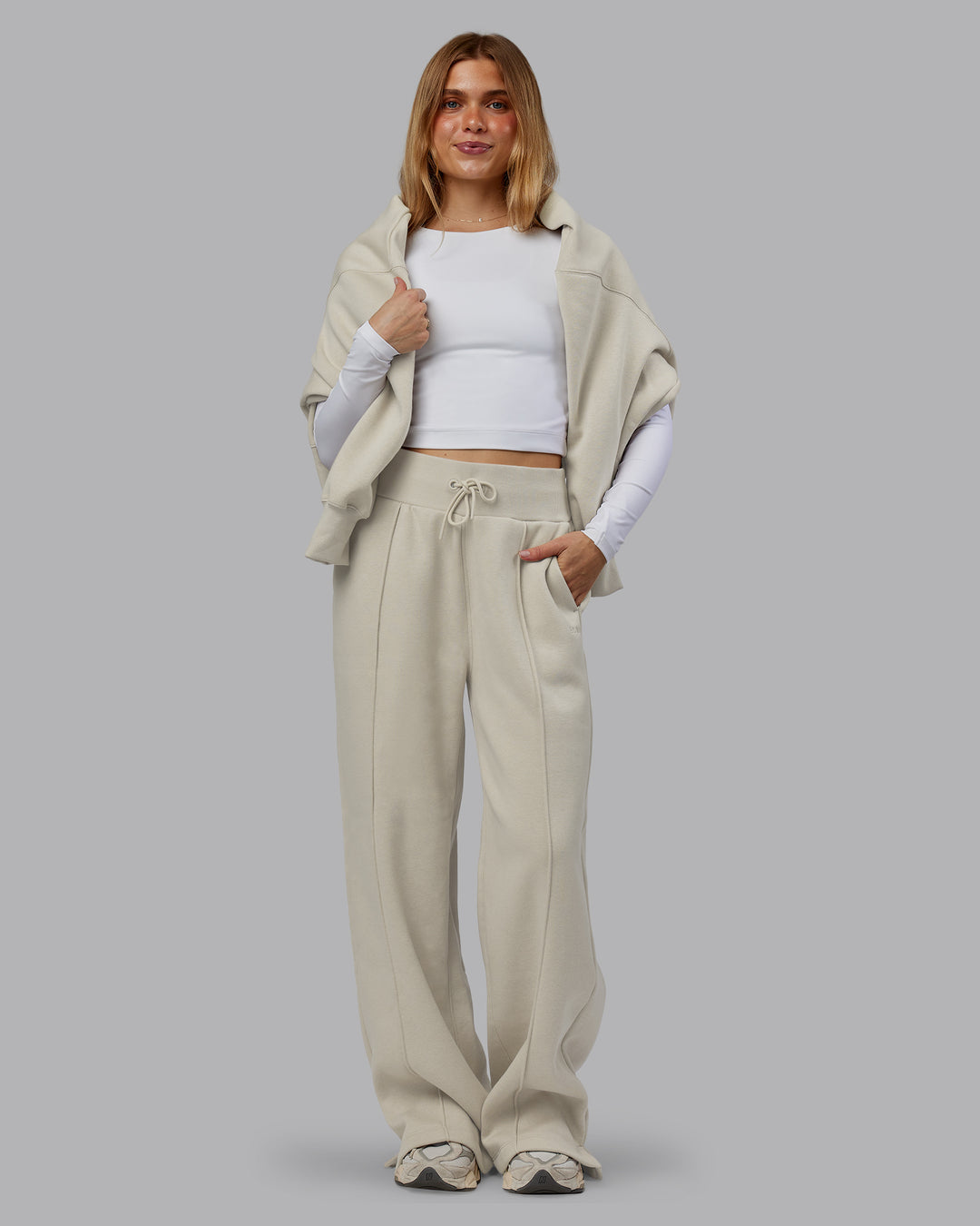 Woman wearing MVP Wide Leg Track Pant - Shale Beige | Model:Emilie | Size:S