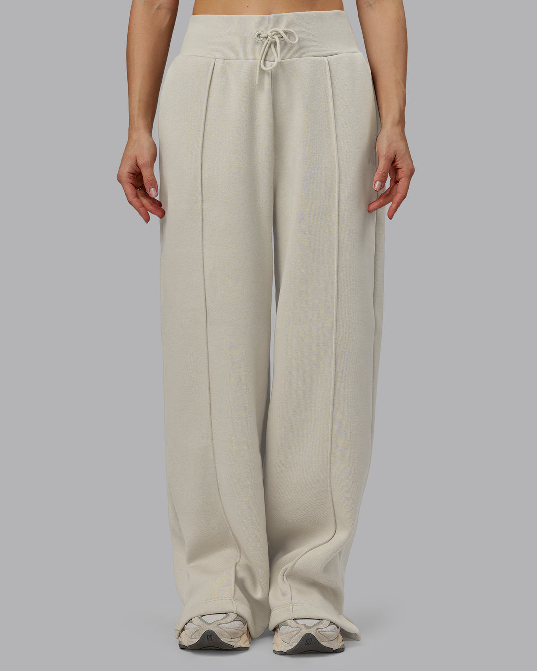 Woman wearing MVP Wide Leg Track Pant - Shale Beige | Model:Emilie | Size:S