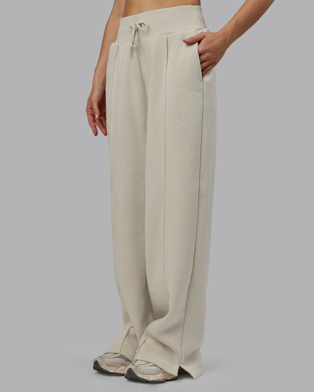 Woman wearing MVP Wide Leg Track Pant - Shale Beige | Model:Emilie | Size:S