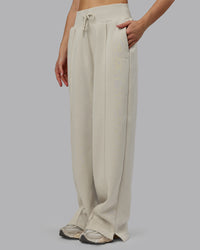 Woman wearing MVP Wide Leg Track Pant - Shale Beige | Model:Emilie | Size:S