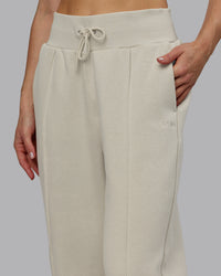 Woman wearing MVP Wide Leg Track Pant - Shale Beige | Model:Emilie | Size:S